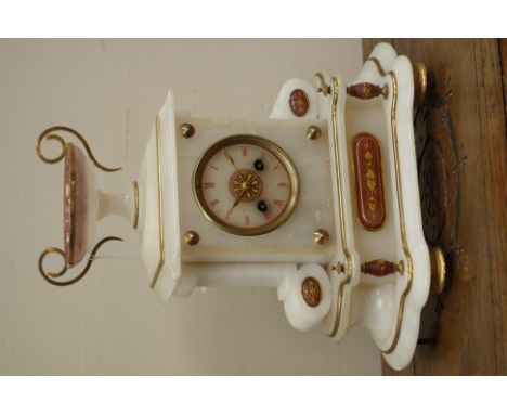 Late 19th  century alabaster and gilt metal mantel clock with urn cresting, French twin train movement striking half hours on