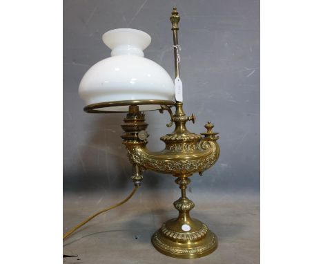 A Victorian brass oil lamp by Wild &amp; Wessel, with opaque glass shade, stamped to base, converted to electricity, H.53cm 