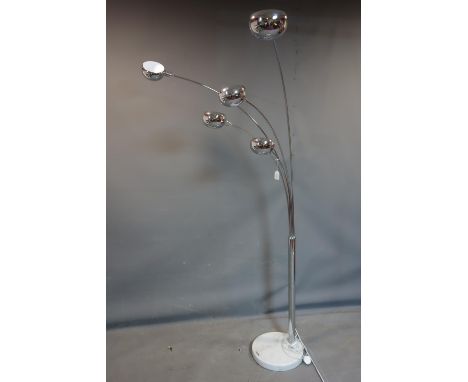A Roche Bobois five branch chrome floor standing lamp, on marble base, with label to base, H.212cm 