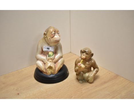Two Beswick Pottery figures, Monkey on black glazed pottery base No397 and a pipe smoking Chimpanzee No1049.