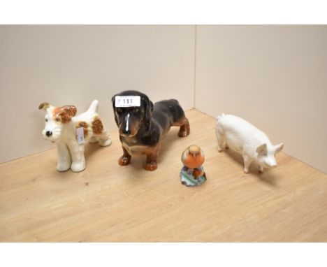 A Beswick Pottery dog study 'dachshund' standing number 361, modelled by Mr Watkin in black and tan gloss 14cm, sold along wi