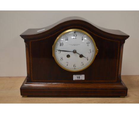 A good quality Edwardian inlaid-mahogany arched top mantel clock, retailed by Hamilton &amp; Inches, Edinburgh, the striking 