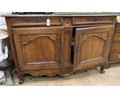 An 18th century French walnut commode, W.145cm