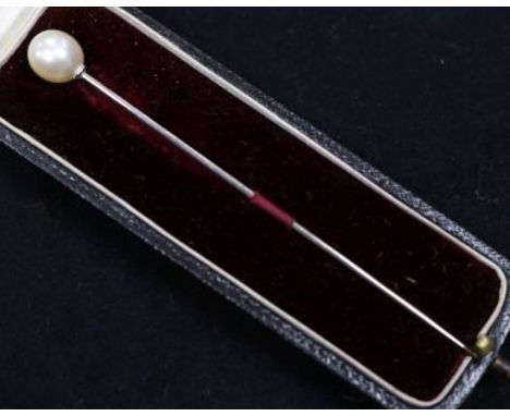 A cultured pearl set stick pin, in Goldsmiths & Silversmiths box.