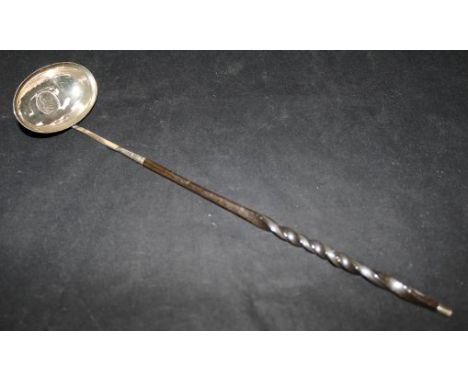 A Georgian silver toddy ladle with baleen handle, 13.75in.