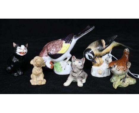 A group of ceramic animals