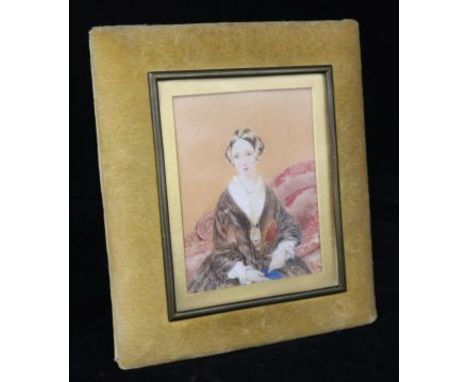 Victorian School, a watercolour miniature portrait of a young lady