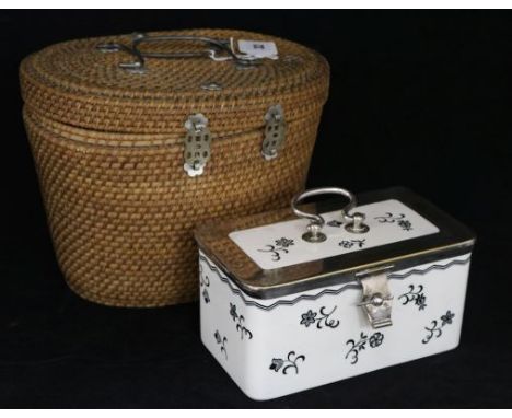 A Chinese teapot in wicker case and a ceramic sandwich box