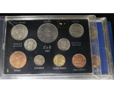 A collection of UK proof coin sets, some silver