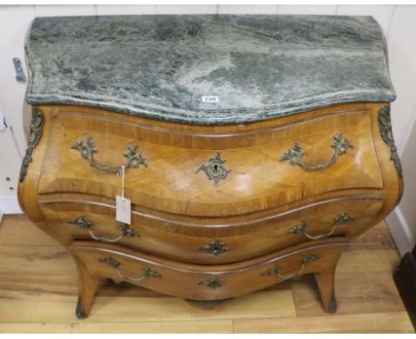 A Louis XV style parquetry inlaid bombe commode, W.110cm