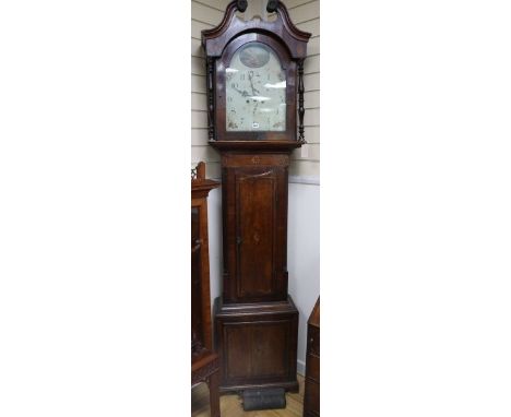 An early 19th century mahogany and oak eight day longcase clock