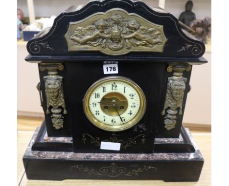 A black marble mantel clock
