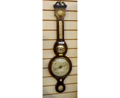 Early 19th century rosewood wheel barometer with swan neck pediment, dry/damp dial and thermometer, steel dial to the baromet