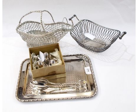 Metal filigree wine basket, pair of salad tongs, tray with beaded border, trio of salt, pepper and mustard pots in a wire car