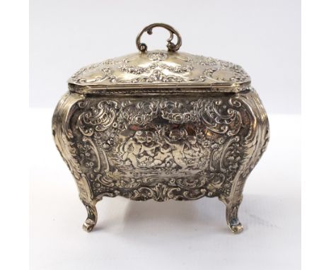 Continental silver tea caddy with hinged cover, repousse rococo decoration, raised on cabriole legs, marked "800", width 13cm