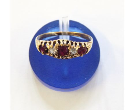 18ct gold, ruby and diamond five-stone ring with central oval cut ruby flanked by pair brilliant cut diamonds, with two furth
