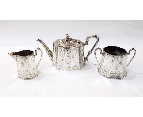 Victorian teapot with reeded decoration to lid with melon-shaped finial, decorated with floral and scroll decoration, octagon