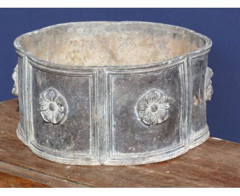 Large 19th century lead garden planter of six lobe shape with six panels with central rosette to each (with drainage holes an