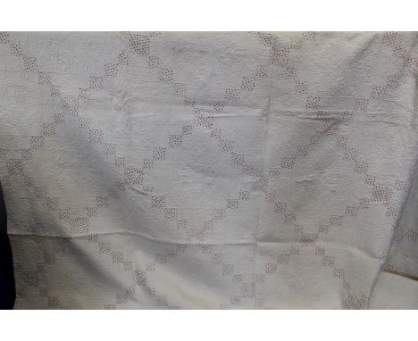 Victorian pieced white cotton and floral chintz quilted bedspread, the lattice panels with central flowerhead roundels, fish 