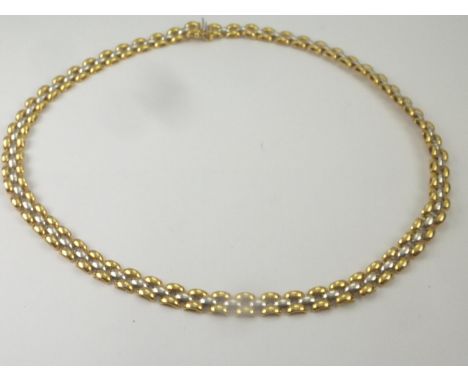 9ct coloured gold necklace of rectangular domed pattern. Weight20g.  