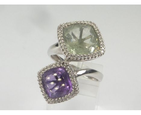 Cross over ring with amethyst and pale aventurine quartz collets, each with tiny diamonds, in sizes, 18ct white gold. Size 'P