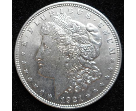 U.S.A. One dollar. Silver Morgan. 1921. Some slight scratches otherwise NVF. Also 2 Eisenhower dollars. 1976, 1978 and 2 x do