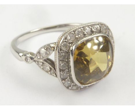 Cluster ring of cushion shape with yellow chrysoberyl and mixed cut diamonds in 18ct white gold. Size 'N'.Condition report:Ve