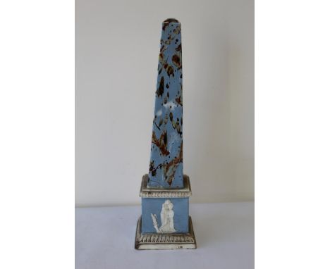 Late 18th century pearlware obelisk in the manner of Ralph Wood, the marbled column on square plinth base decorated with clas