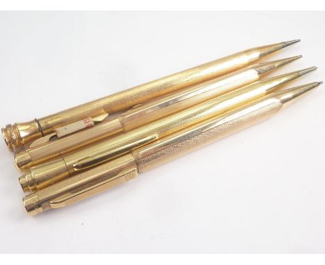Two Eversharp propelling pencils and two others, all rolled gold. (4). 