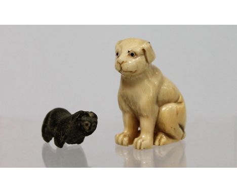 Japanese Meiji period carved ivory netsuke in the form of a seated dog, three carved character marks to underside, 4cm high; 