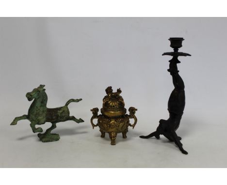 Oriental brass Koro decorated with scrolling dragons with lion dog handles and finial, six character mark to base, 14cm high;