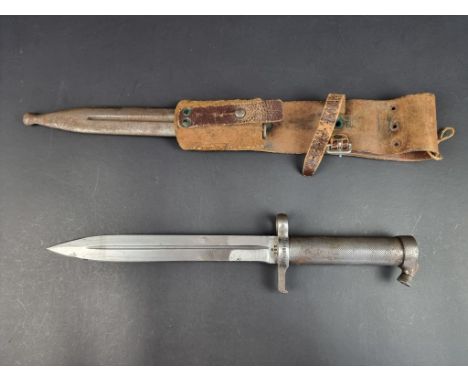 A WWII Swedish M96 Mauser rifle bayonet and scabbard, with 20.5cm single edged fullered blade, by E.A.B, unit marked, with le