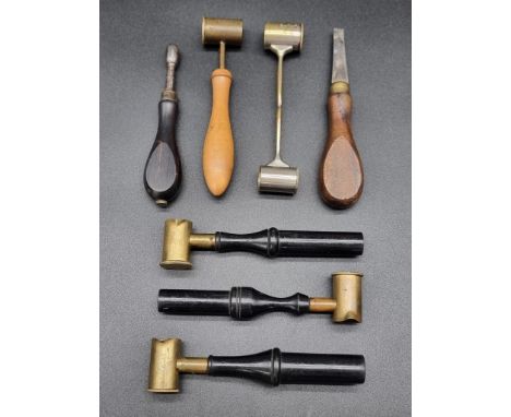 A Gunsmith's screwdriver, 13cm; together with a Gunsmith's turnkey, 12cm; and five powder measures. (7)