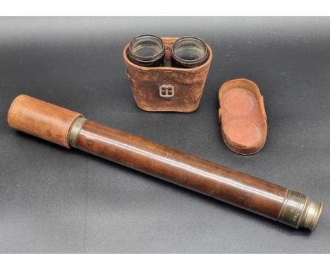 A leather covered three drawer telescope, by Dolland; together with a pair of cased field binoculars. (2)