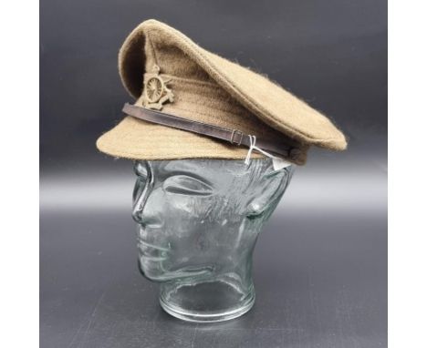 A rare WWI Army Cyclists Corps other ranks khaki woollen service cap, with 16 spoke badge.