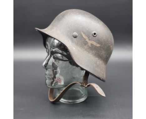 A WWII German M40 Luftwaffe single decal helmet, by&nbsp;FW Quist / Esslingen, stamped Q 62.