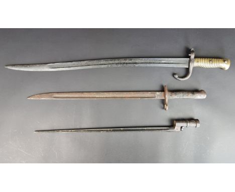 Three bayonets; to include a&nbsp;French Chassepot M1866 sword bayonet. (3)