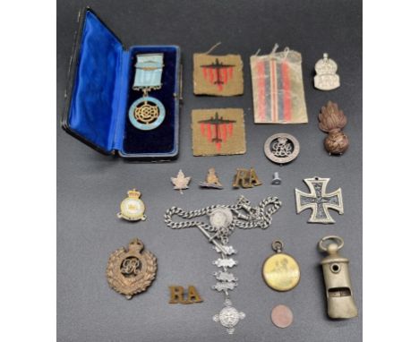 A small group of militaria; together with a silver curb link watch chain; and a Masonic silver gilt medal. (18) 