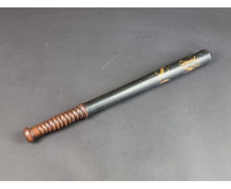A Victorian Police Special Constables ebonized turned hardwood truncheon, painted V R cypher with S.C below, 48cm long.