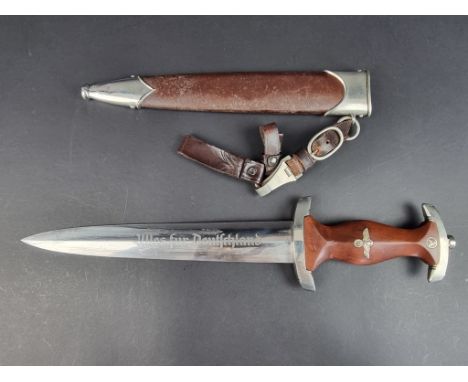 A German Third Reich SA dagger, the blade marked 'Alles Fur Deutschland', by&nbsp;Böntgen &amp; Sabin, Solingen, the fruitwoo