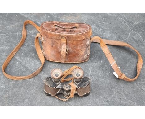 A pair of WWI British military issued Carl Zeiss London Prismatic MkII binoculars, dated 1916, in original leather case by A 
