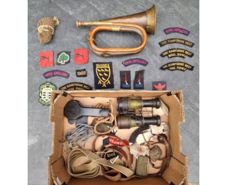 A quantity of militaria, to include a bugle.