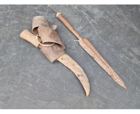 A dagger and sheath, having curved 28cm blade; together with a steel spear head, 45.5cm long. (2)