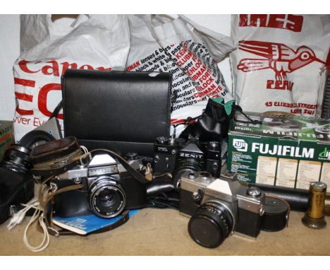  A quantity of camera and camera equipment   to include a ZENIT TTL camera, two Practica cameras, an Argus lens, a Sunagor Ma