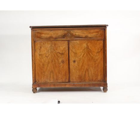 A 19th century French figured walnut commode with hinged top and a pair of doors on turned feet, w. 90 cm Top warped, refurbi