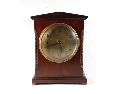 A gilt faced bracket clock with twin train striking movement in a mahogany case, h. 29 cm  tired, No guarantee as to working 