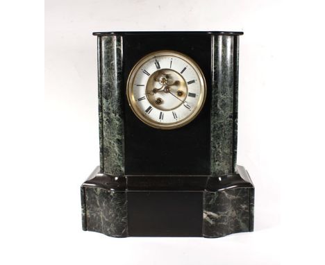 An Edwardian mantle clock with visible escapement in a slate and serpentine case, h. 34 cm  dial with hariline cracks, case w