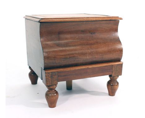 A 19th century walnut step commode with faux leather top and serpentine front, h. 42 cm Some wear, structurally sound