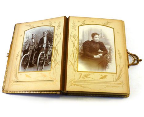 Victorian Photograph Album. Compact qto., textured and embossed leather binding with working clasp, aeg, containing contempor