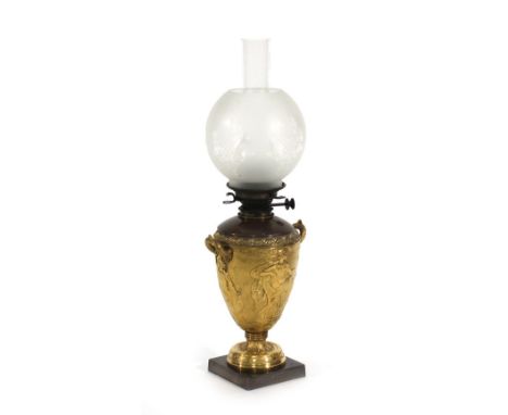 A gilt metal oil lamp in the form of a neo classical vase, h. 36 cm with funnel and shade  rubbed 